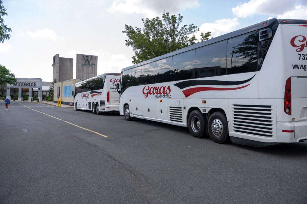 Corporate Shuttle Service: What the Setup Actually Involves 2 White corporate shuttle bus parked and ready for a scheduled pickup