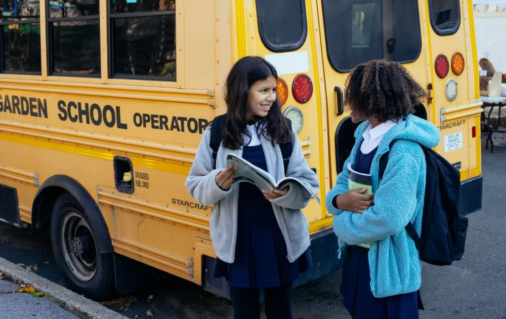 Student Transportation Services: Daily Routes vs. Chartered Trips 4 Students deciding between a daily bus route and a chartered trip